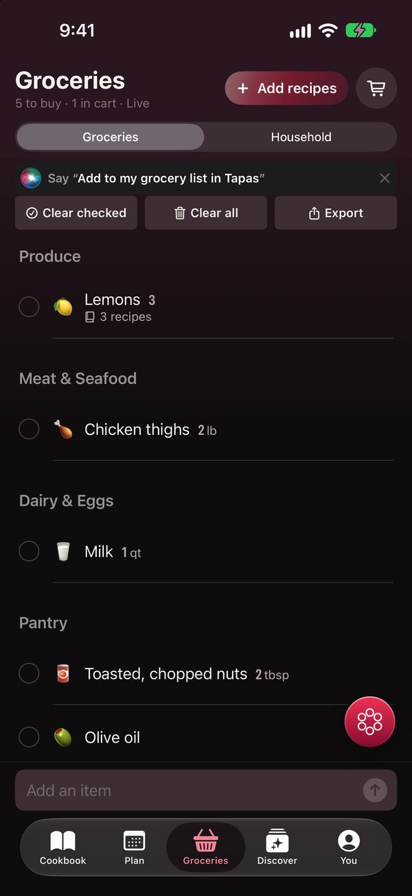 The groceries tab, grouped by aisle, with Siri's own tip card at the top reading Say, Add to my grocery list in Tapas.